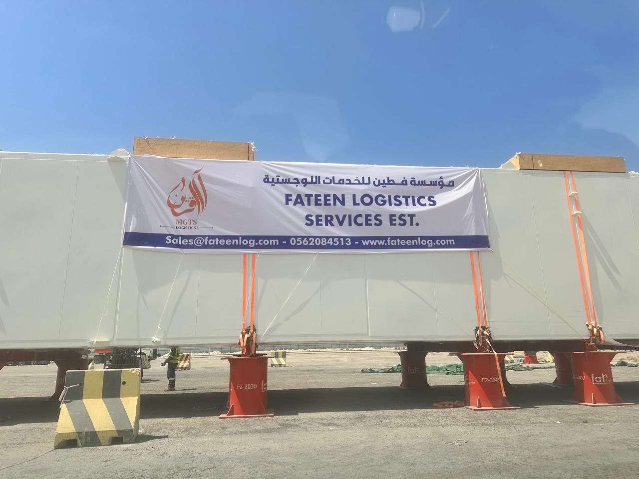 Oversized modular cargo on a Fateen Logistics heavy-haul trailer