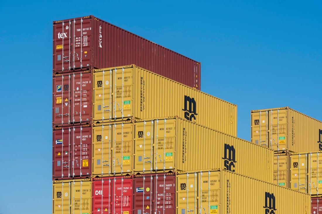 Stacked shipping containers at port